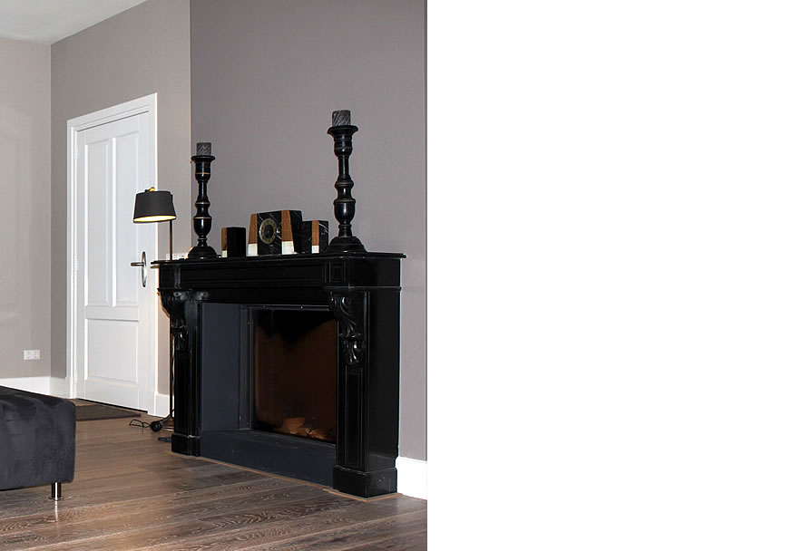 Herbestemming: hotel wordt woonhuis - klassieke zwarte open haard